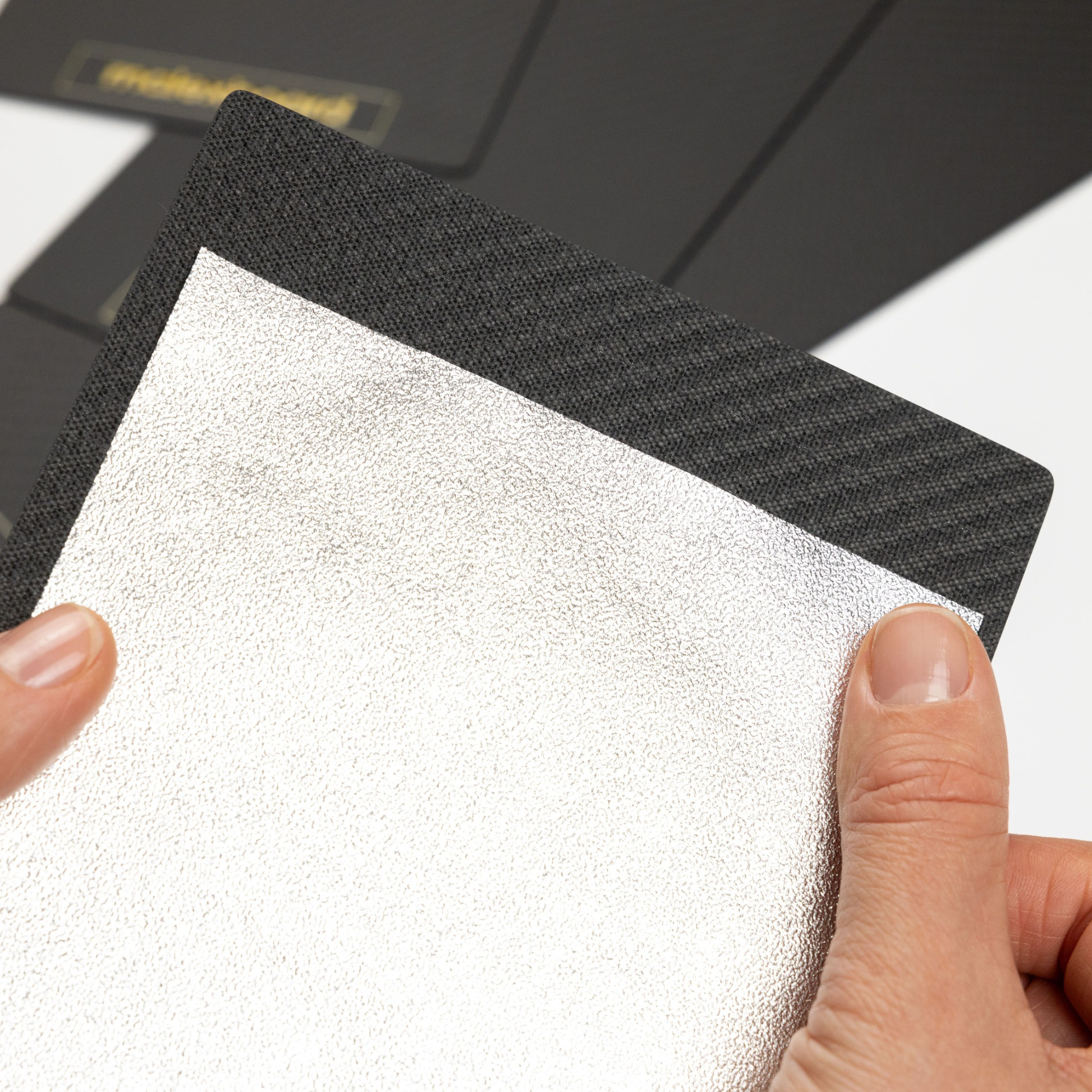 Foil held securely on the textured edge of a carbon fiber foil board by malexboard
